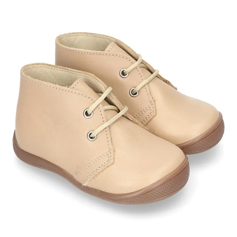 Botita niños cordones con puntera y talonera en piel EXTRA SUAVE.