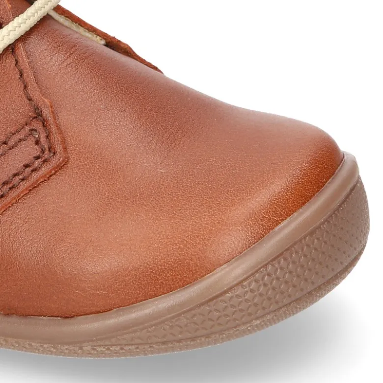 Botita niños cordones con puntera y talonera en piel EXTRA SUAVE.
