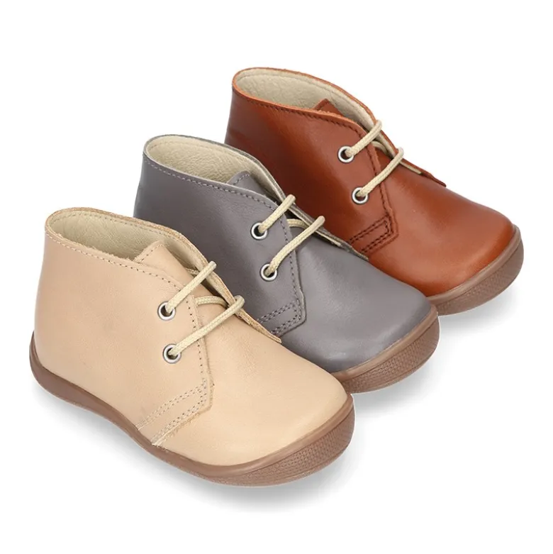 Botita niños cordones con puntera y talonera en piel EXTRA SUAVE.