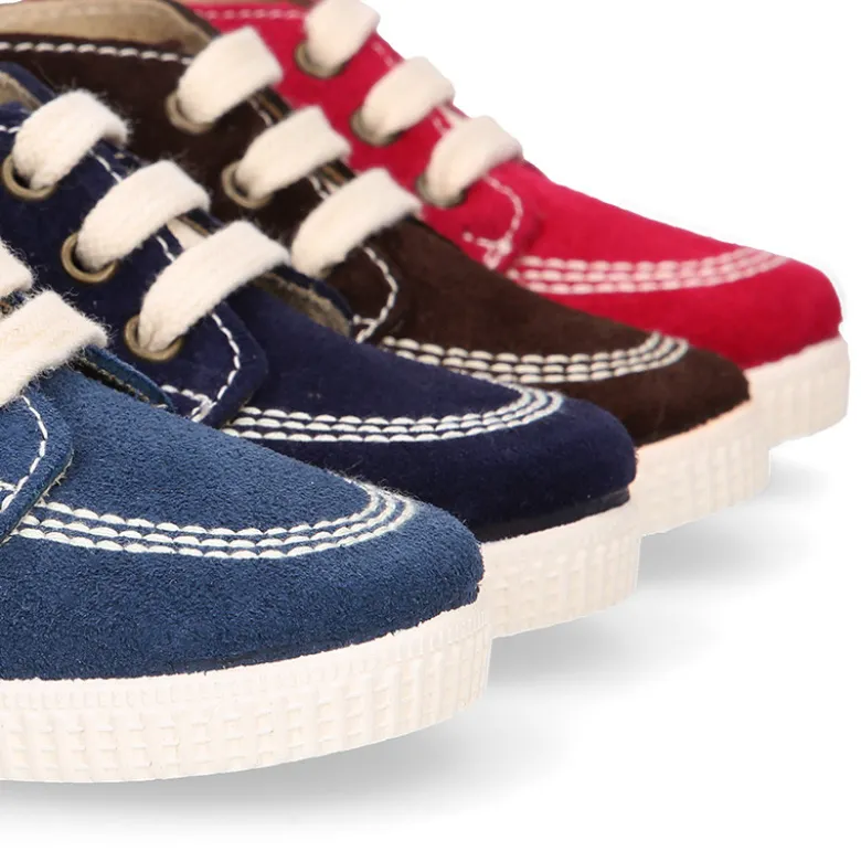 Botitas casual con cordones en piel Serraje.