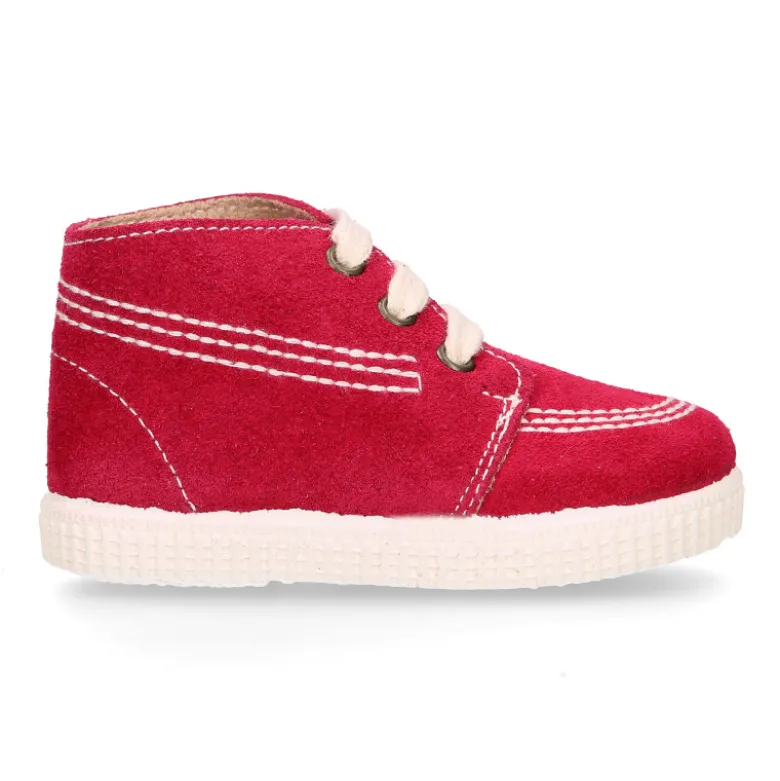 Botitas casual con cordones en piel Serraje.