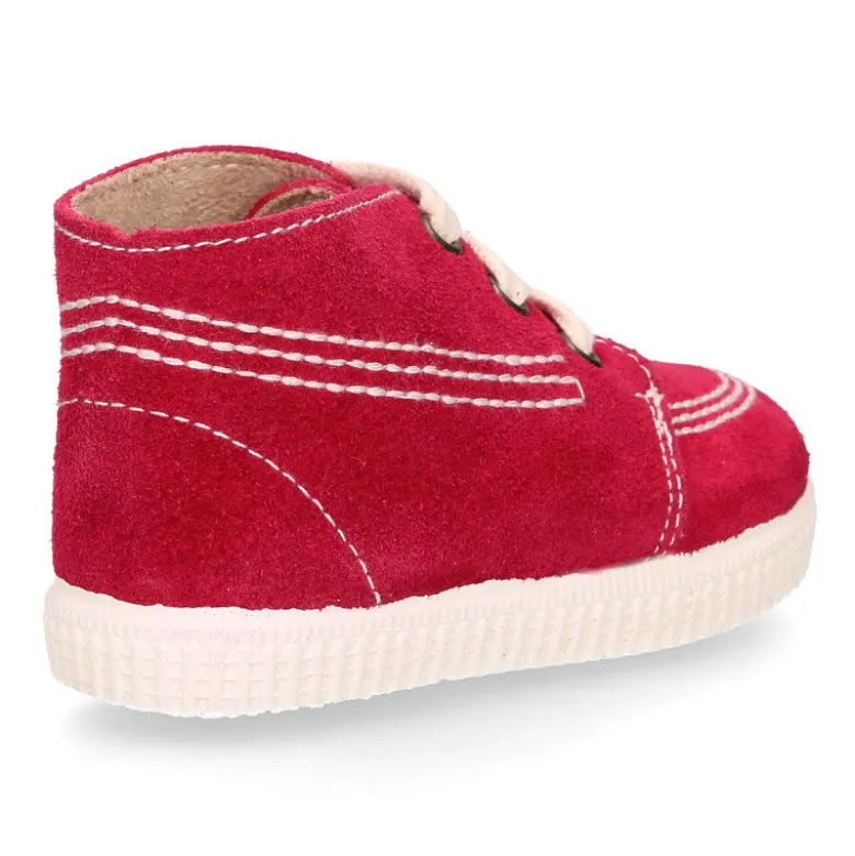 Botitas casual con cordones en piel Serraje.