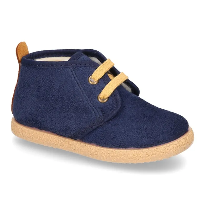 Botitas casual niños con cordones y BORREGO en Serratex.