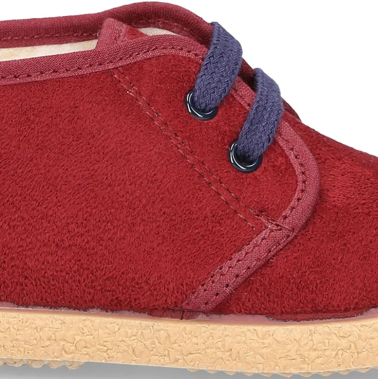 Botitas casual niños con cordones y BORREGO en Serratex.