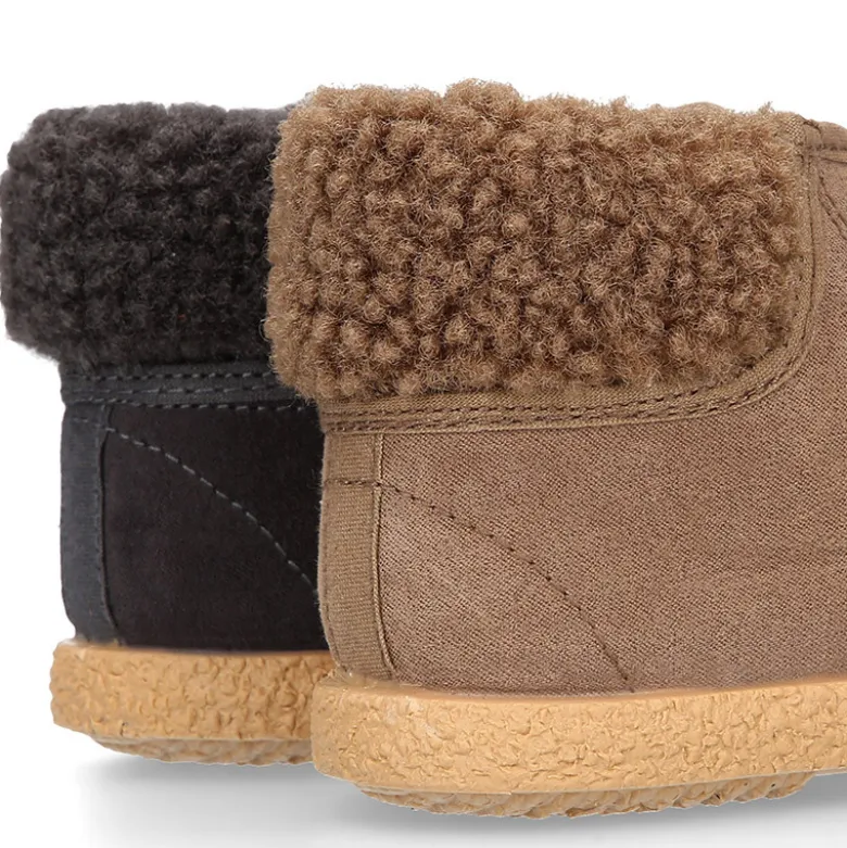 Botitas casual niños con cordones y cuello borrego en Serratex.