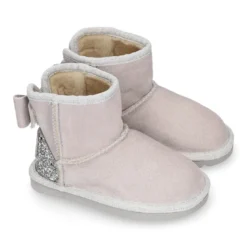 Botitas niña tipo Australianas niña en piel serraje con LAZO y GLITTER.