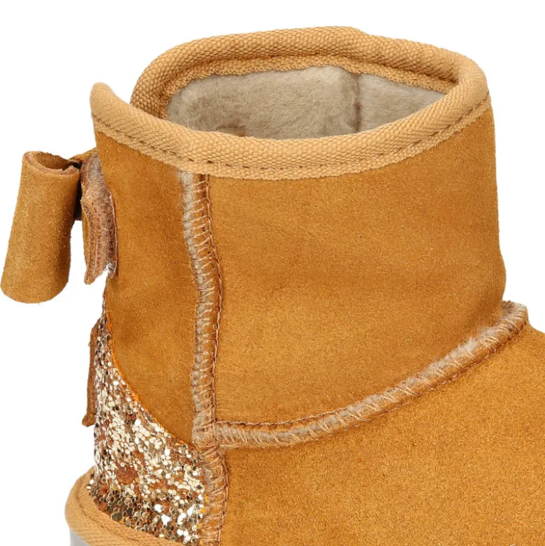 Botitas niña tipo Australianas niña en piel serraje con LAZO y GLITTER.