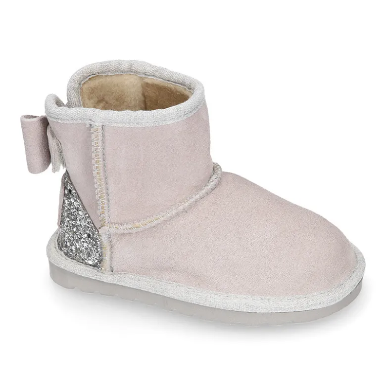 Botitas niña tipo Australianas niña en piel serraje con LAZO y GLITTER.