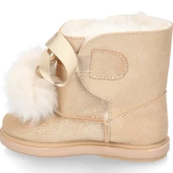 Botitas tipo Australianas niña con diseño con POMPONES en piel serraje metalizado.