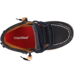 Botita tipo INDIA con flecos y cordones en piel serraje.