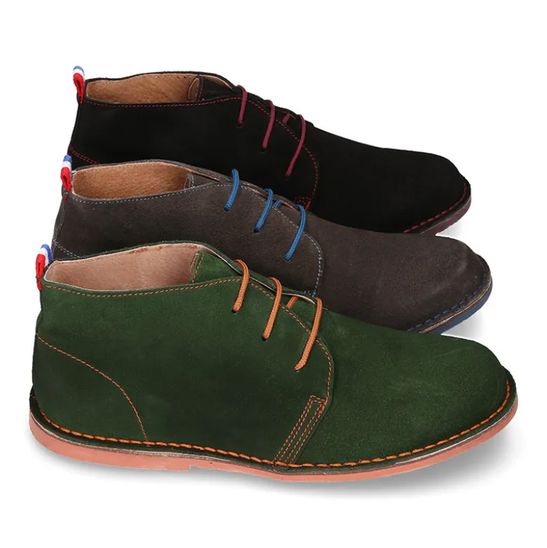 Botín tipo blucher para vestir con cordones, suela y cosidos a contraste en serraje.