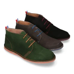 Botín tipo blucher para vestir con cordones, suela y cosidos a contraste en serraje.