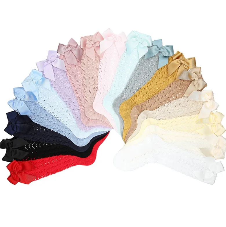 CALCETÍN ALTO PERLÉ CALADO CON LAZOS CONDOR.