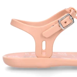 Cangrejera niña tipo sandalia en forma de T con ESTRELLAS en rosa.