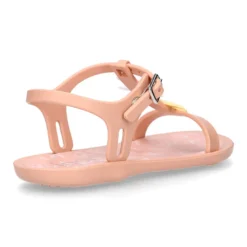 Cangrejera niña tipo sandalia en forma de T con ESTRELLAS en rosa.