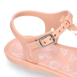 Cangrejera niña tipo sandalia en forma de T con ESTRELLAS en rosa.