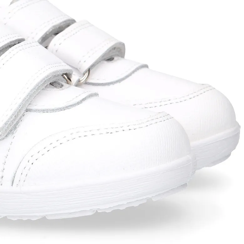 Deportiva colegial niños clásica sin cordones y puntera reforzada en piel lavable.