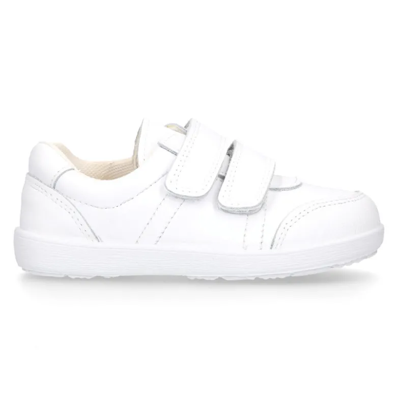 Deportiva colegial niños clásica sin cordones y puntera reforzada en piel lavable.