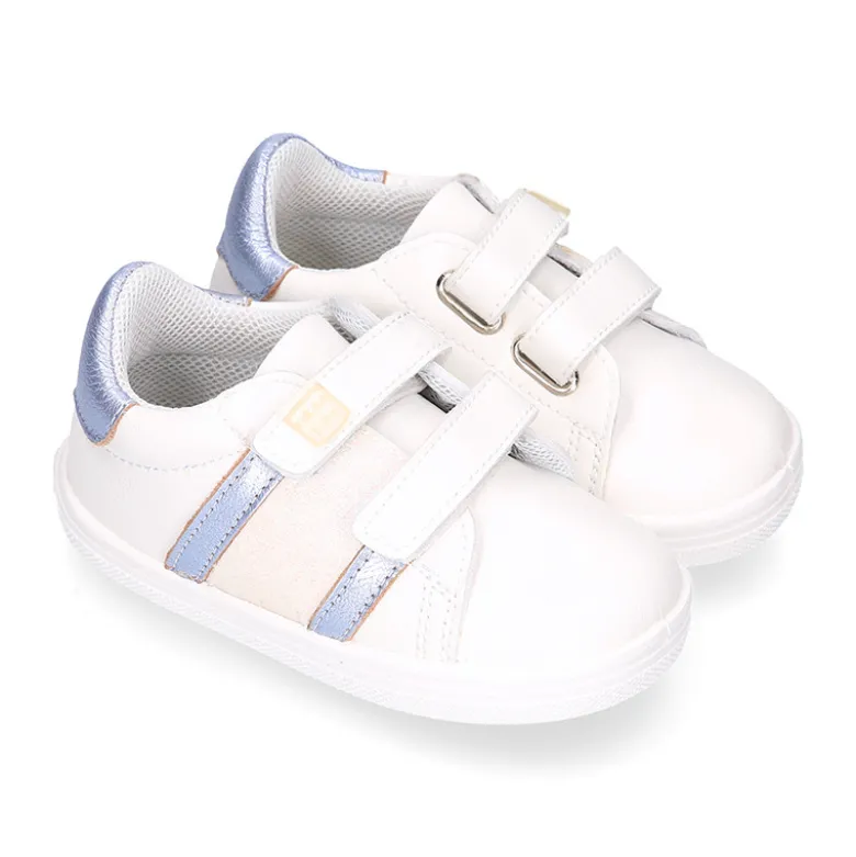Deportiva niña OKAA FLEX sin cordones en color Blanco con rayas plata.