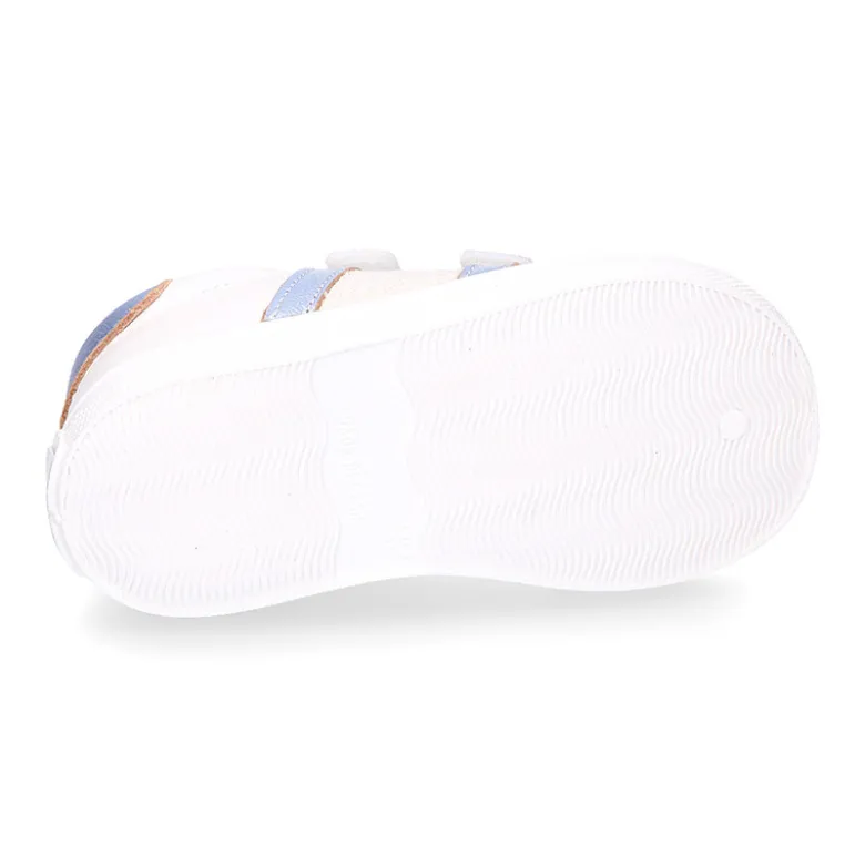 Deportiva niña OKAA FLEX sin cordones en color Blanco con rayas plata.