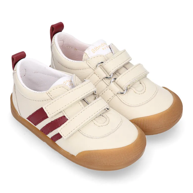 Deportivas respetuosas Blanditos By Crio´s Luna con rayas y sin cordones en piel suave.