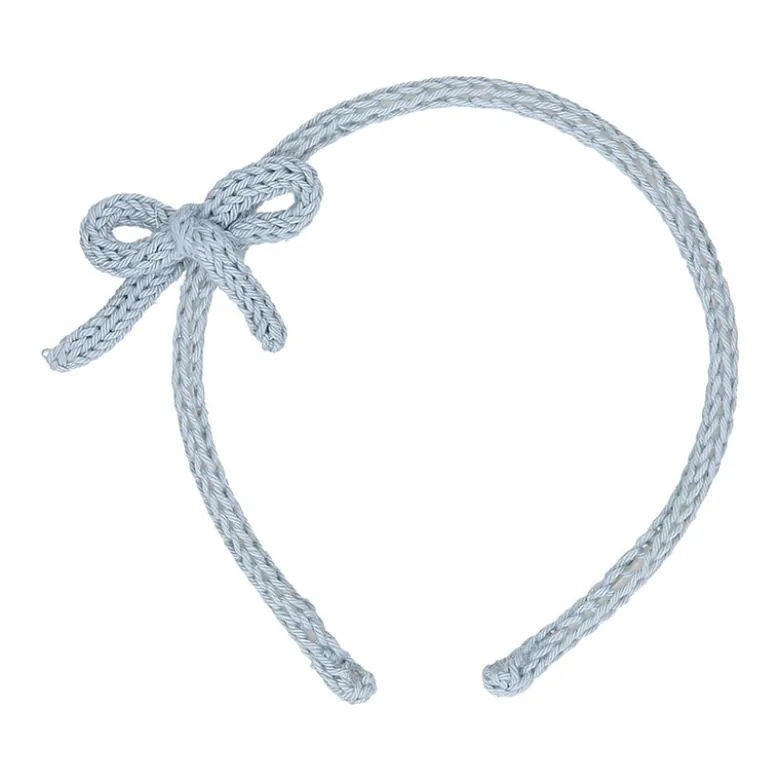 Diadema para el pelo de niña con lazo en lana de colores de primavera verano.