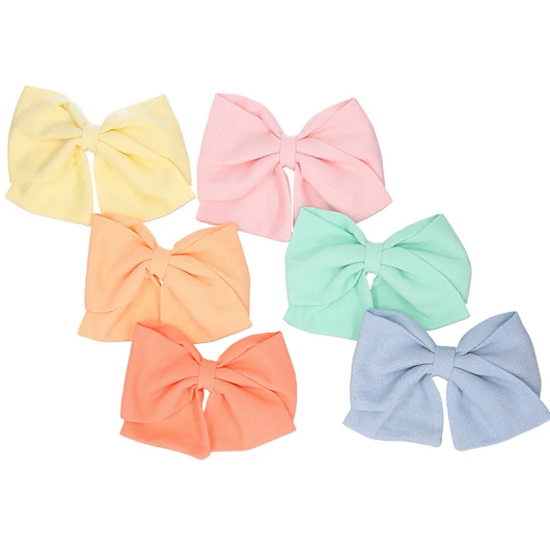 Lazo para el pelo de niña en tela de colores de primavera verano con pinza pico pato.