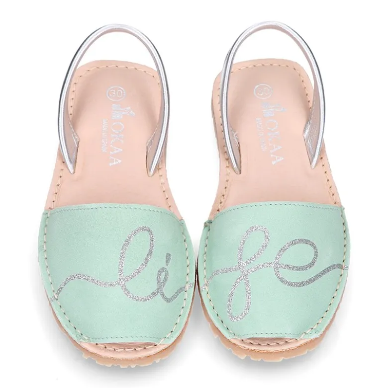 Menorquina niña Tira en piel ante combinada con diseño con LETRAS.
