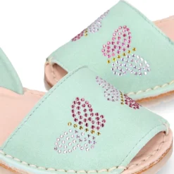 Menorquina niña Tira en piel ante menta con diseño con MARIPOSAS.