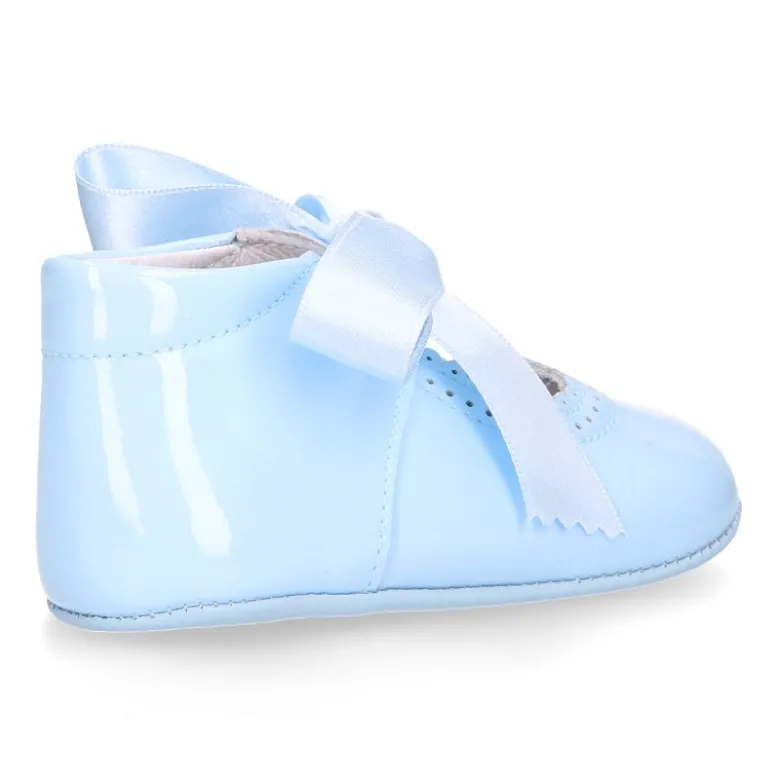 Mercedita angelito bebé niña con LAZO en piel charol.