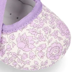 Mercedita bebé niña con lazo tipo angelito en lona LIBERTY.