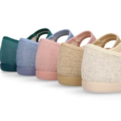 Mercedita niña con cierre adherente y botón en lona LINO.