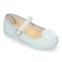 Mercedita niña en lino con flor y hebilla.