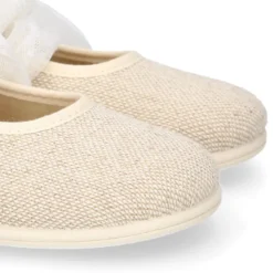 Mercedita niña tipo angelito en lino natural con lazo plumeti.