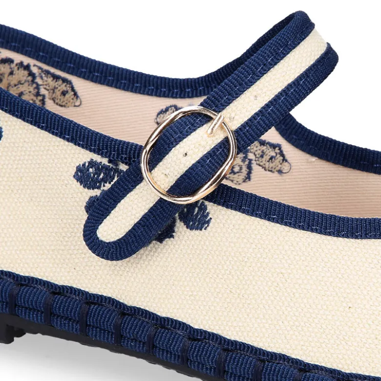 Merceditas de lino beige bordadas en azul para mujer