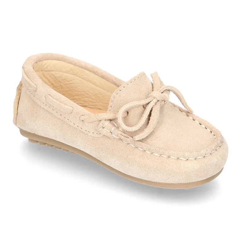 Mocasín lazos peques piso conductor en serraje.