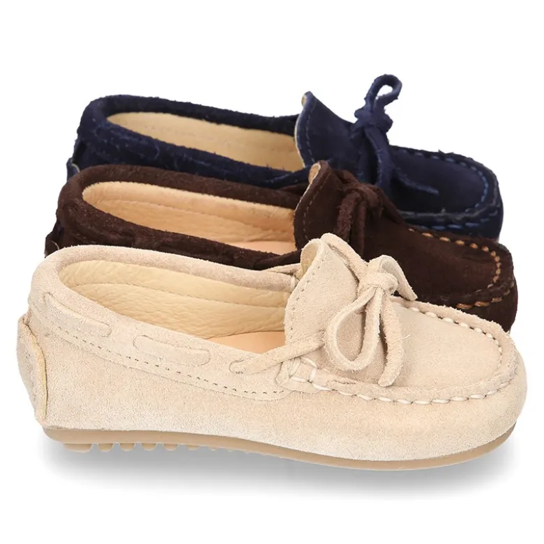 Mocasín lazos peques piso conductor en serraje.
