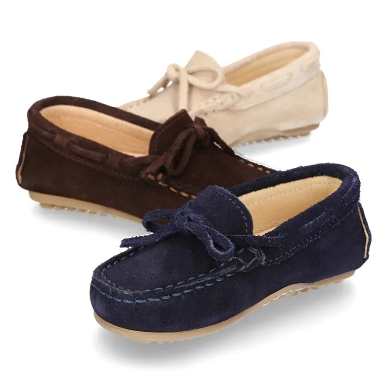 Mocasín lazos peques piso conductor en serraje.
