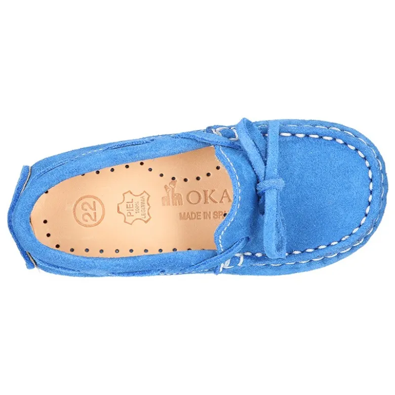 Mocasín lazos peques piso conductor en piel serraje.