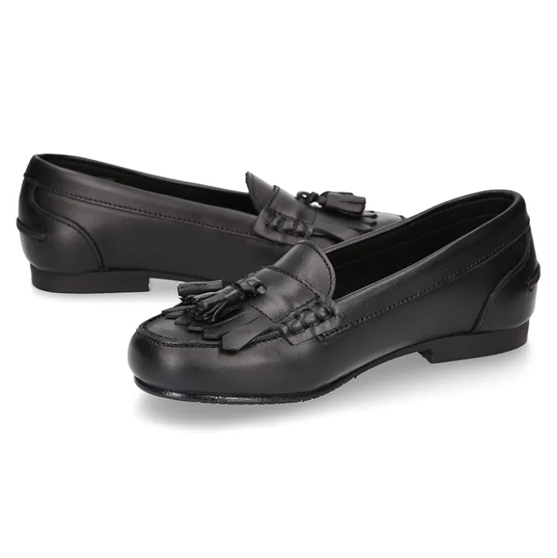 Mocasín NIÑA colegial con borlas y flecos en piel Boxcalf.