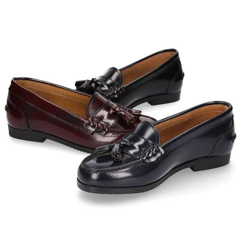Mocasín NIÑA colegial con borlas en piel Antik.