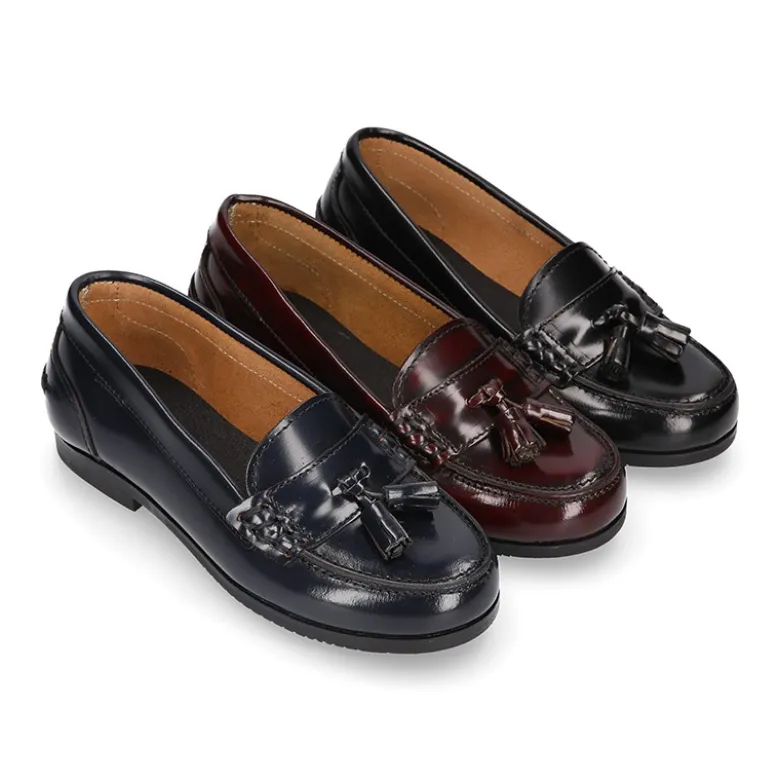 Mocasín NIÑA colegial con borlas en piel Antik.