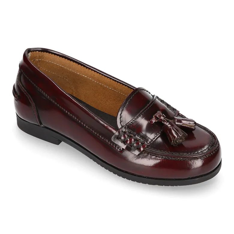 Mocasín NIÑA colegial con borlas en piel Antik.