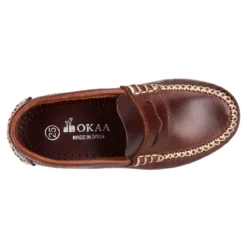 Mocasín niños antifaz en piel trabajada en colores clásicos.