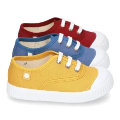Nueva Bamba de lona con puntera y cordones.