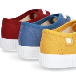 Nueva Bamba de lona con puntera y cordones.