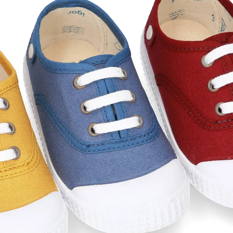 Nueva Bamba de lona con puntera y cordones.