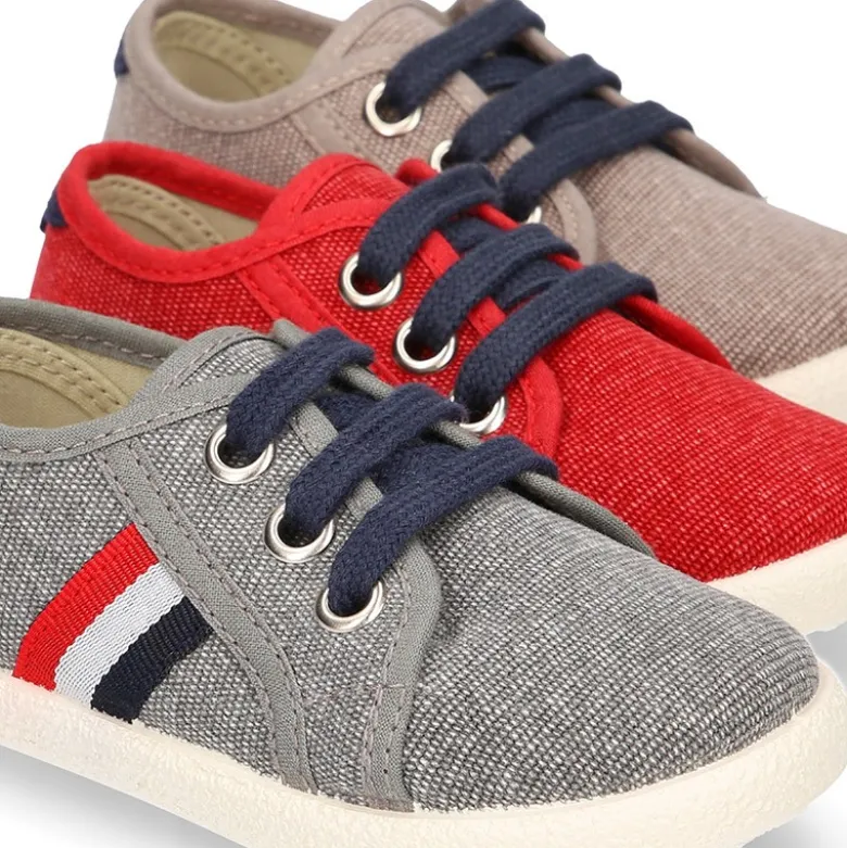 Nuevo Tenis con cordones en lona EFECTO LAVADO con bandera lateral.