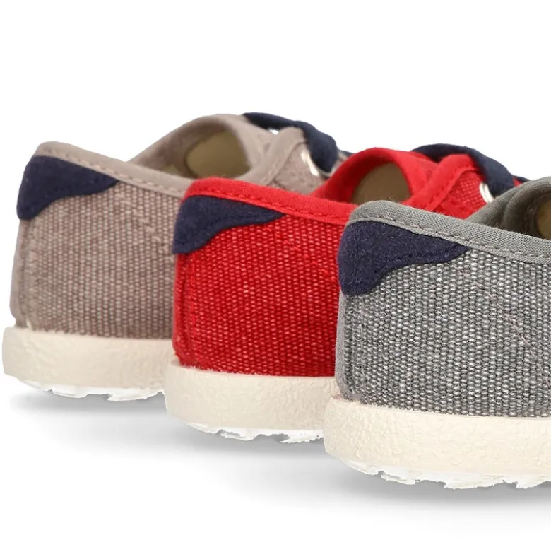Nuevo Tenis con cordones en lona EFECTO LAVADO con bandera lateral.