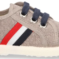 Nuevo Tenis con cordones en lona EFECTO LAVADO con bandera lateral.